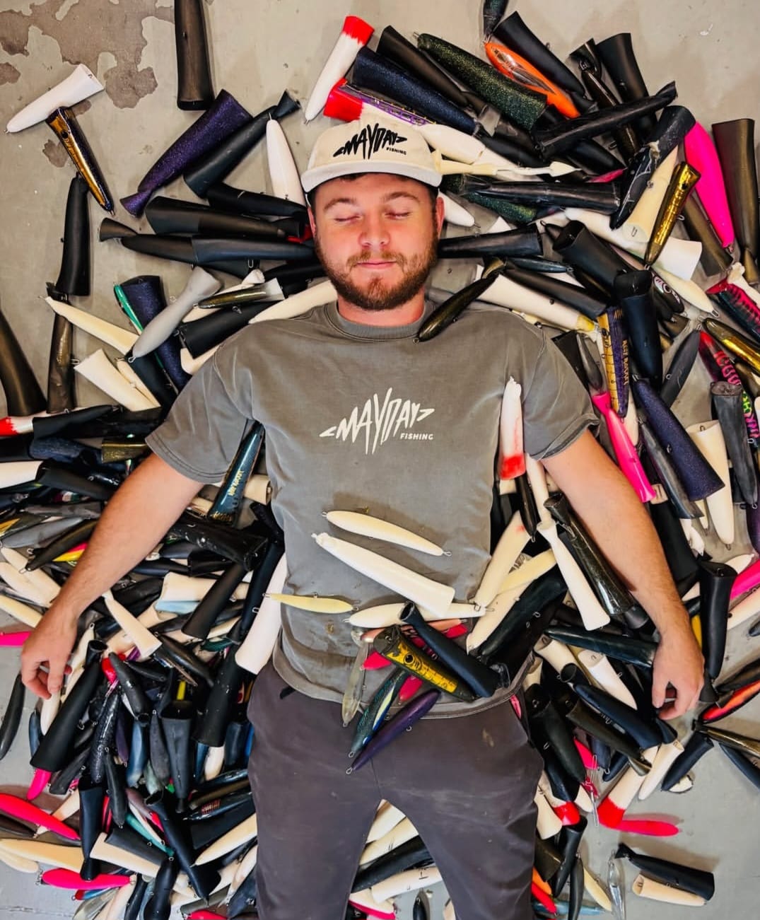 Mayday maker surrounded by handcrafted lures